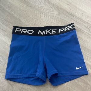 Blue Nike pro shorts
